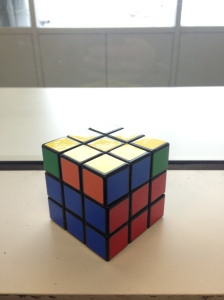 Did I mention that I learned to solve the cube this spring?!  I am still VERY SLOW.  This is what I did on the train for a while, and boy do the other people look at me strangely.  Nicely, but strangely.  